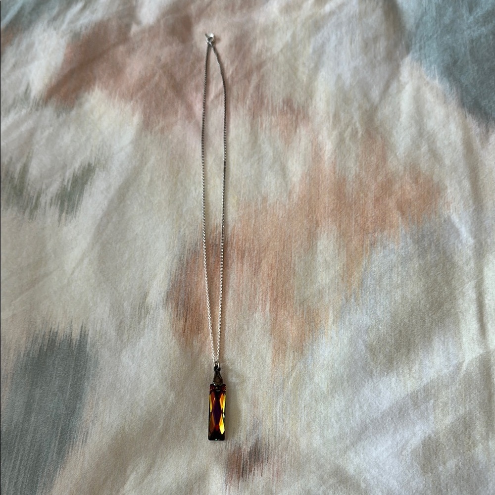 Elegant Silver Toned Necklace with Amber Pendant